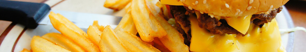 Eating Burger at Kohl's Frozen Custard & Kitchen restaurant in Wrightsville Beach, NC.